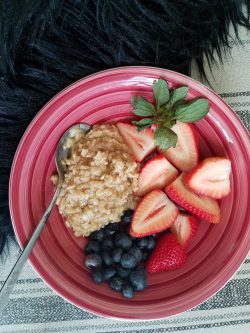 Healthy Eating Steel Cut oatmeal with manuka or local honey and berries (Blueberries and Strawbe ...