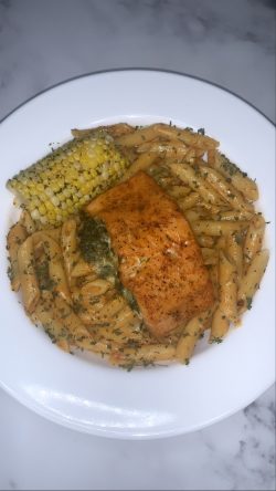 Salmon stuffed with shrimp, spinach and cheese and Cajun pasta.