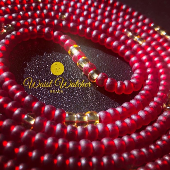 Red and gold waist beads.